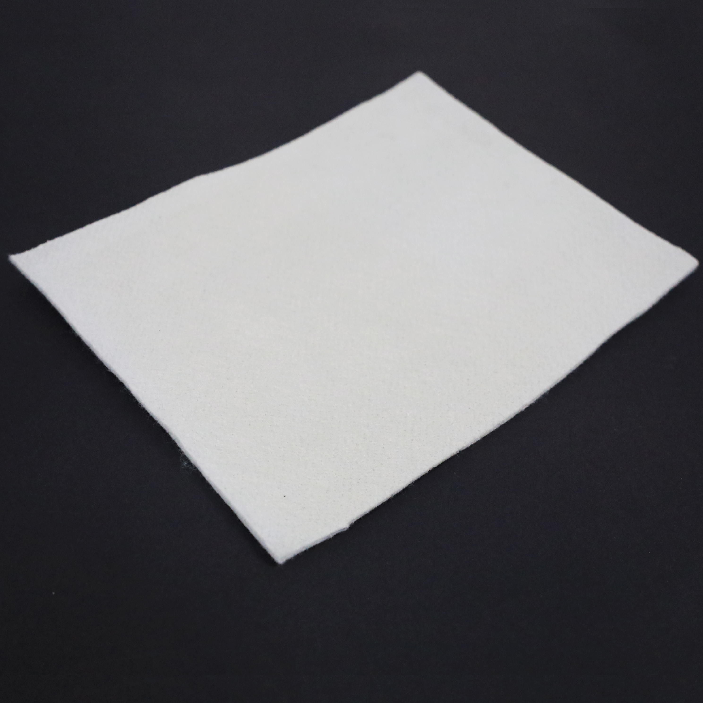 Filtration and isolation performance short fiber geotextile
