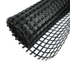 Roll of black fiberglass geogrid for asphalt road reinforcement, high tensile strength
