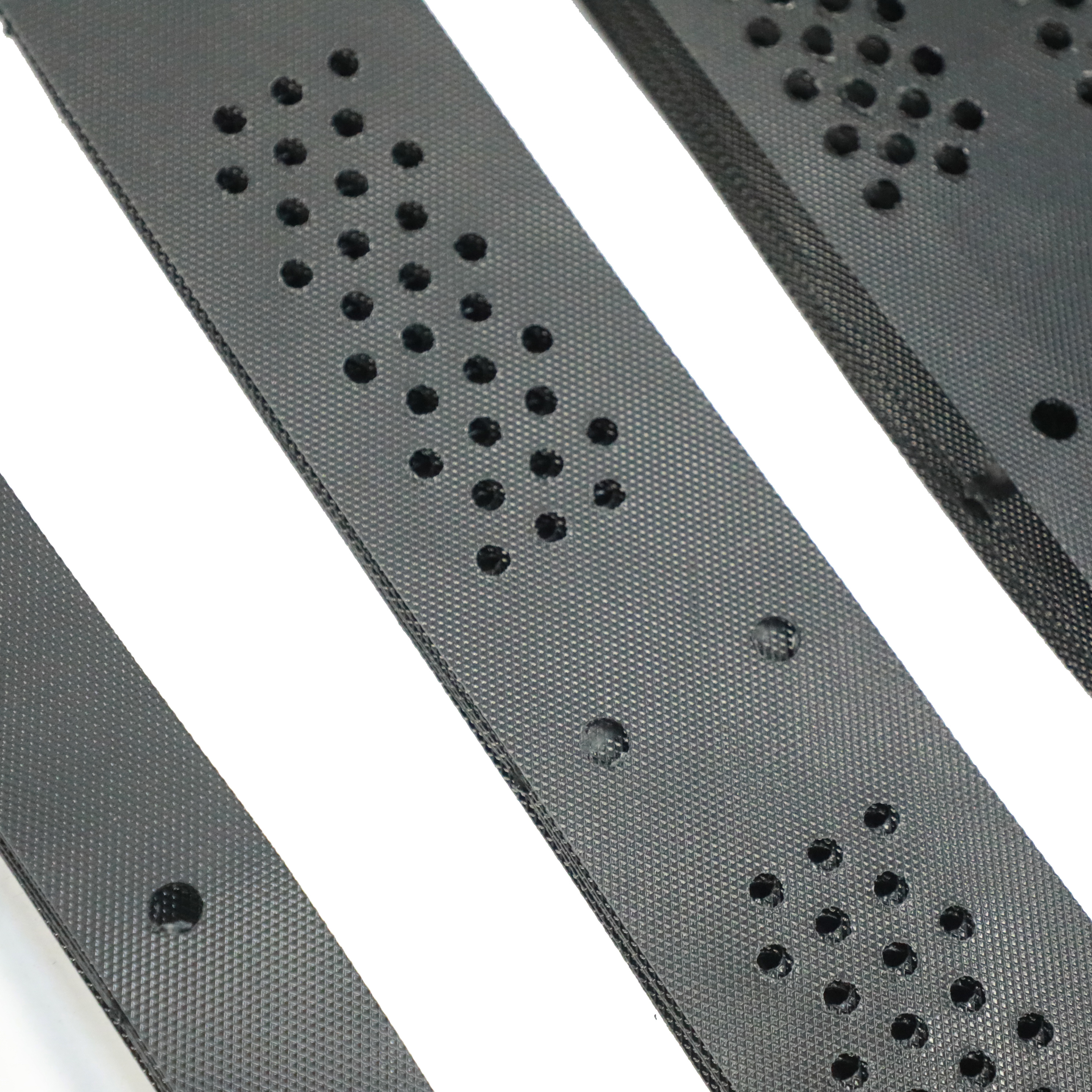 Detailed view of black perforated HDPE geocell panels by Zhongloo